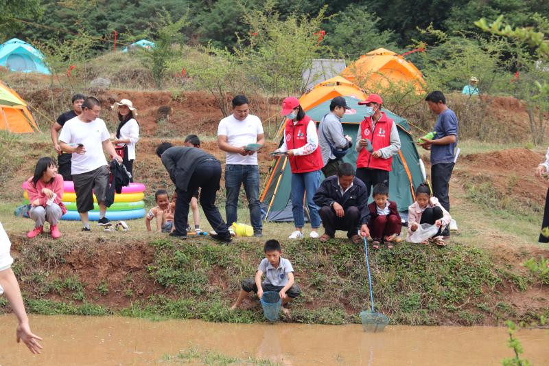 区文旅局组织志愿者到纳章开展文明旅游宣传.jpg